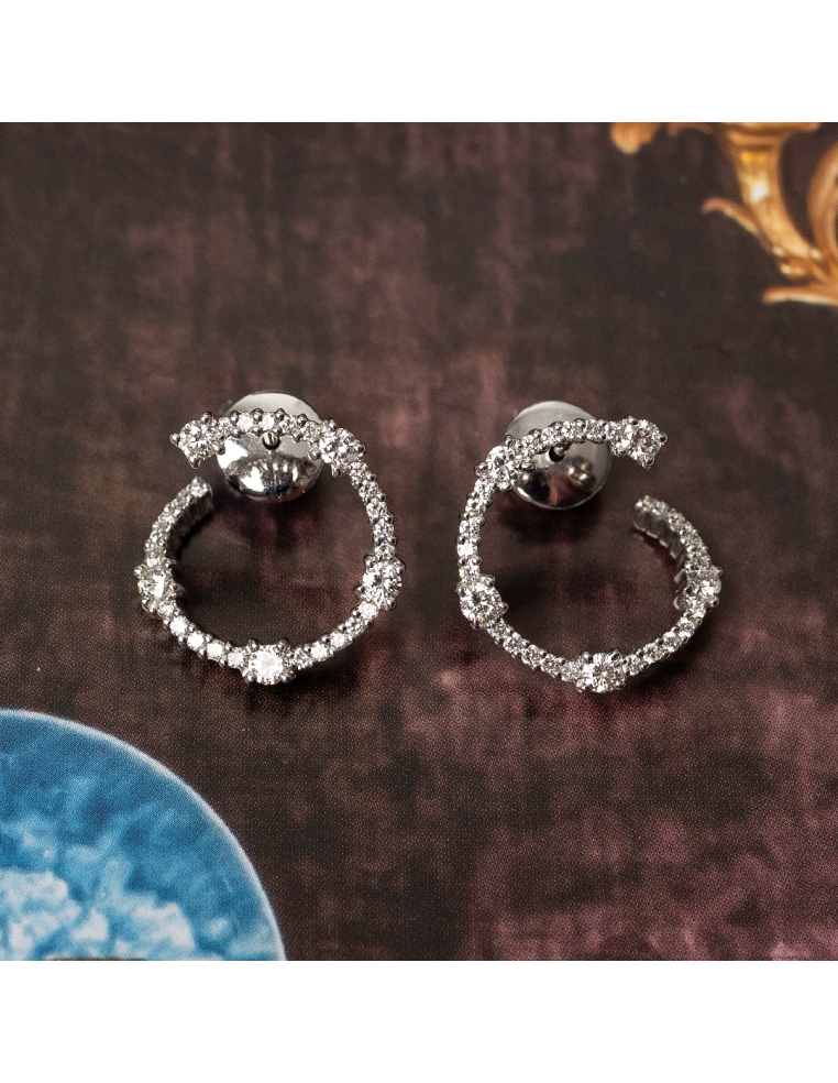 White gold hoop earrings with round-cut diamonds