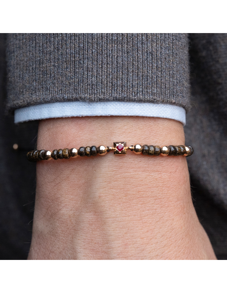 BRACELET “HORUS” OF THREAD WITH ROSE GOLD, HEMATITE AND RUBY CHARMS