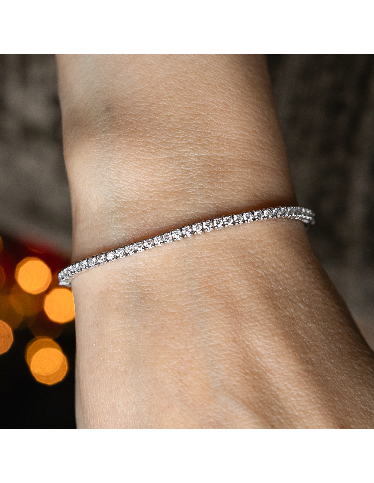 ELEGANCIA ETERNA: PULSERA RIVIERE DE ORO BLANCO CON DIAMANTES