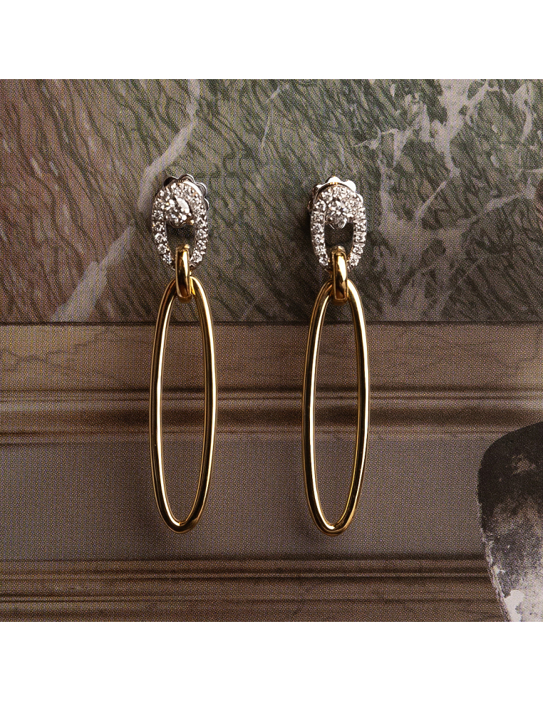 Long gold earrings with diamonds: captivating elegance