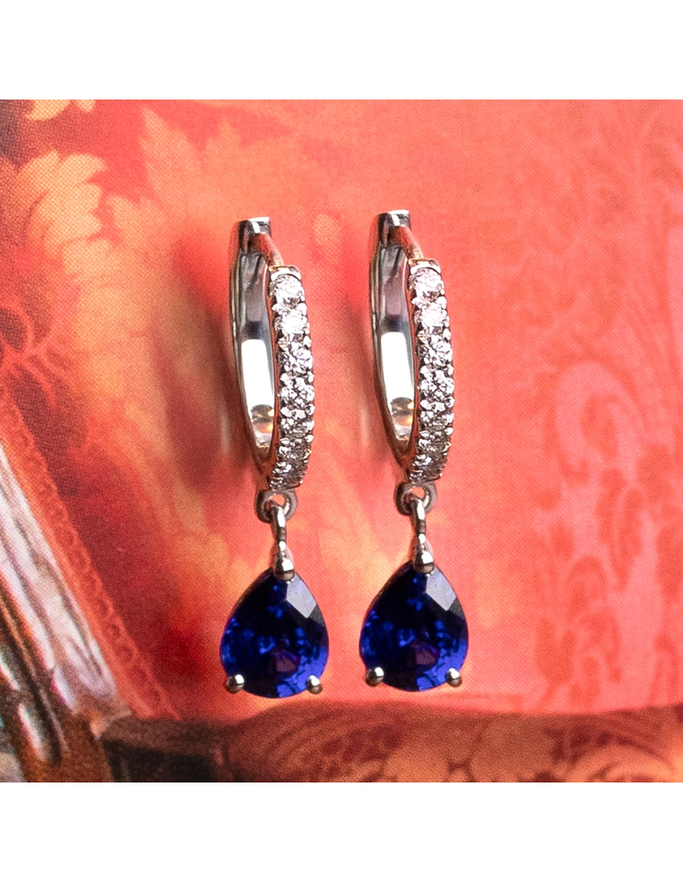 Gold earrings diamonds and sapphires : Elegance and sophistication