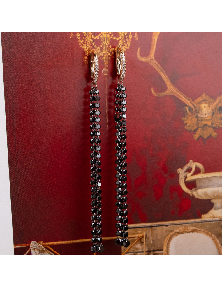 Long gold earrings with black diamonds - Bold sophistication