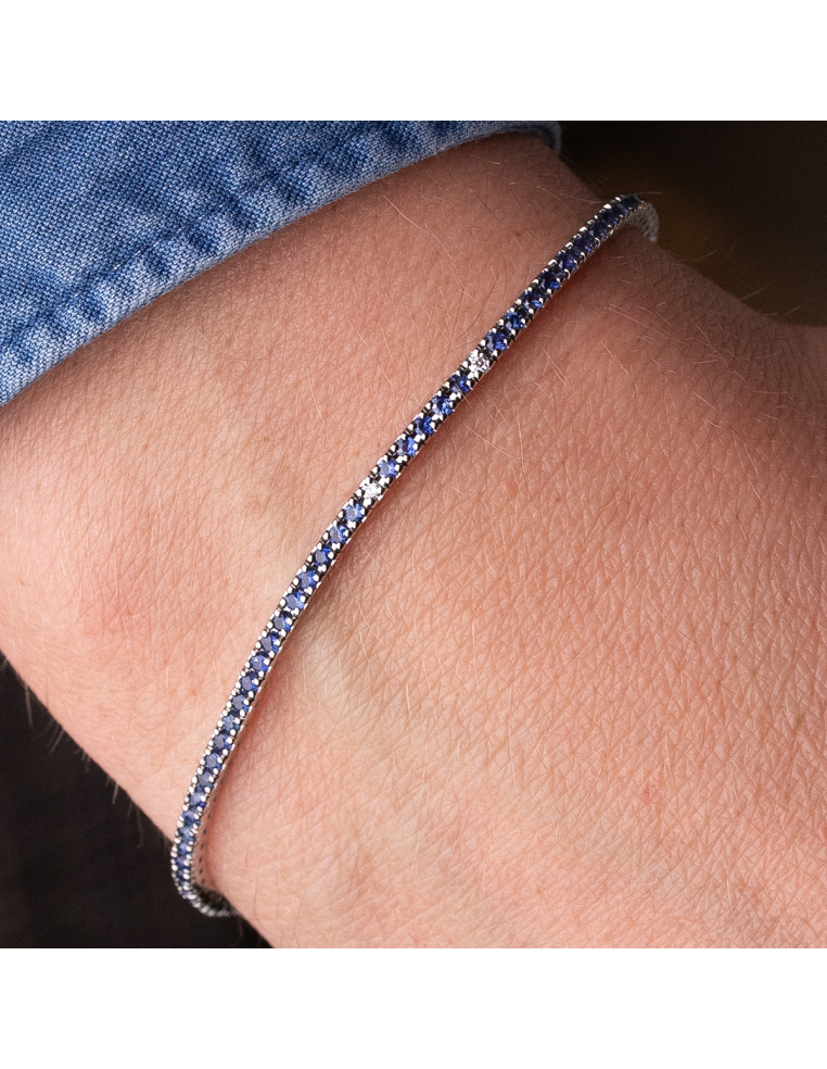 Rivière bracelet in white gold with sapphires and diamonds