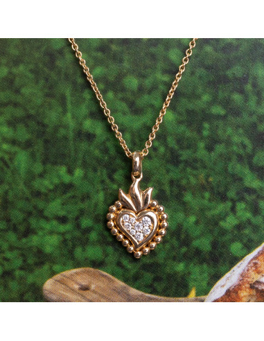 Collar "Amor" de oro rosa con corazón de diamantes. Un símbolo de amor